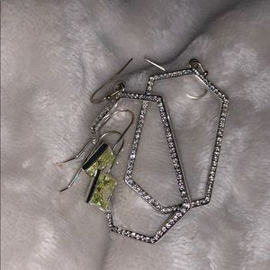 Perido and silver earrings. Both included